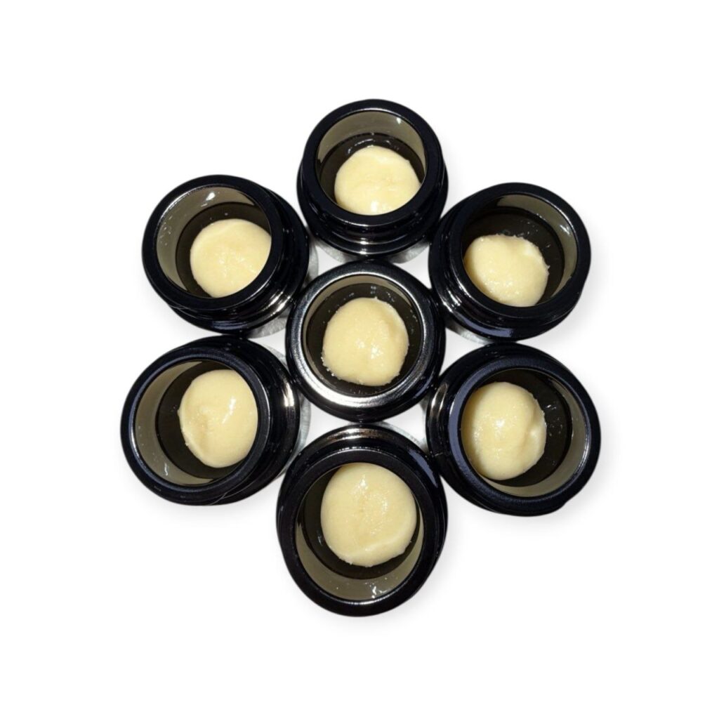 Kapow Berries boutique hash rosin in a glass jar, cold-cured with golden texture and berry-forward terpene profile