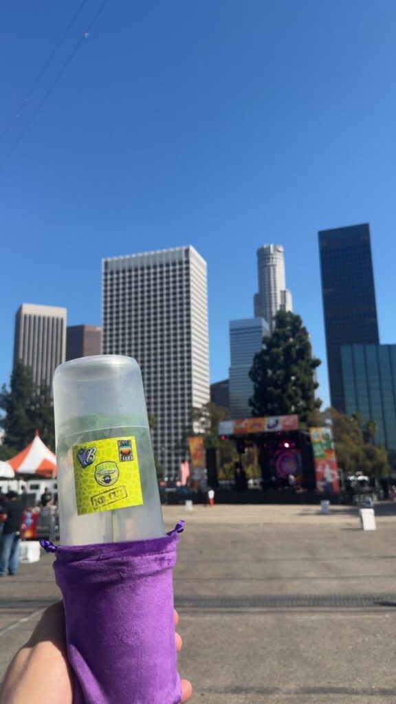 Kapow Berries booth at Puffcon Day 1 with premium THCa flower and rosin jars on display