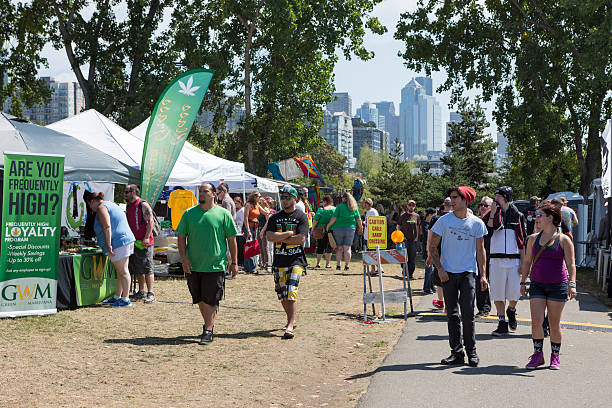 Kapow Berries booth at Puffcon Day 2 with premium THCa flower and rosin jars on display