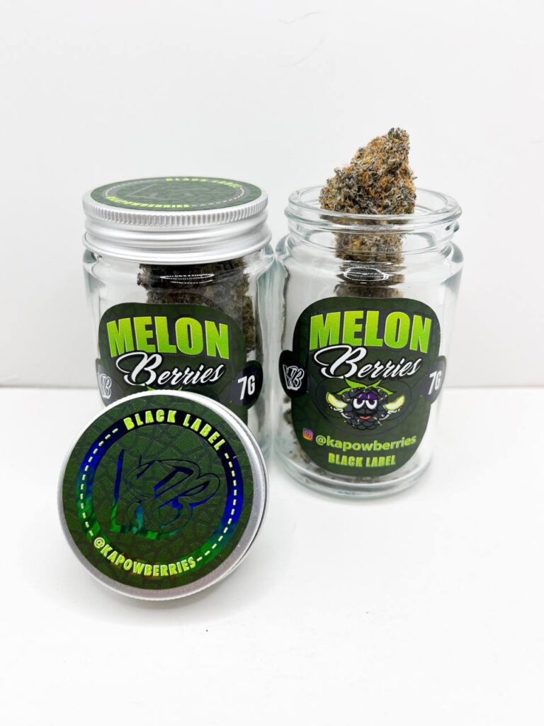 	Close-up of black label melon berries product packaging or item.