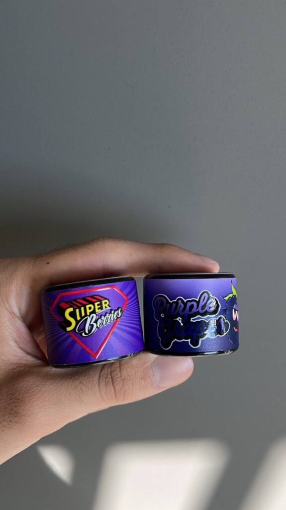 Kapow Berries Purple Grapes Strain Review: Sweet Grape Terps and Relaxing Hybrid Effects Kapow Berries Purple Grapes strain with dense purple buds and boutique packaging